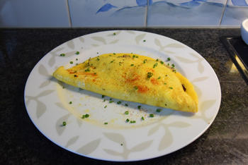 Omelet gevuld met paddenstoelen. 8