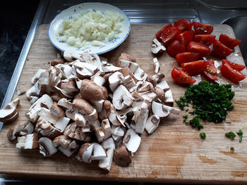 Vegetarisch: Champignons met tomaatjes en gepocheerd ei 5